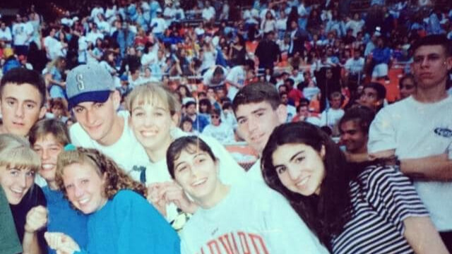 Group of 1990s teens at a concert