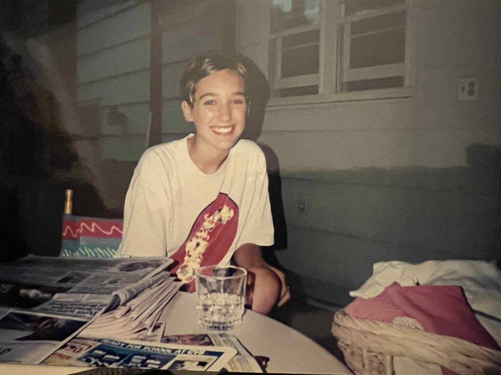1990s teen girl wearing a concert t-shirt